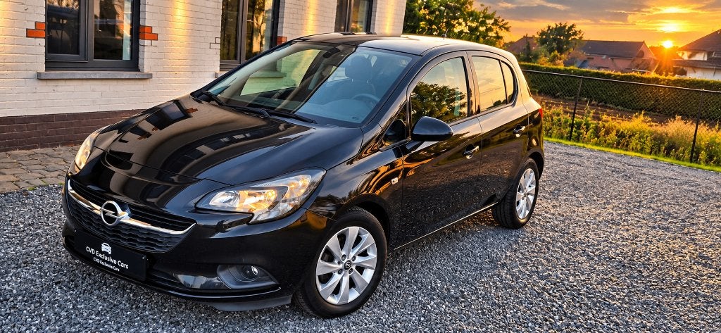Opel Corsa 1.2i - Bluetooth - Dagrijverlichting - 12MGAR, Auto's, Voorwielaandrijving, Dealer onderhouden, Stof, 4 cilinders