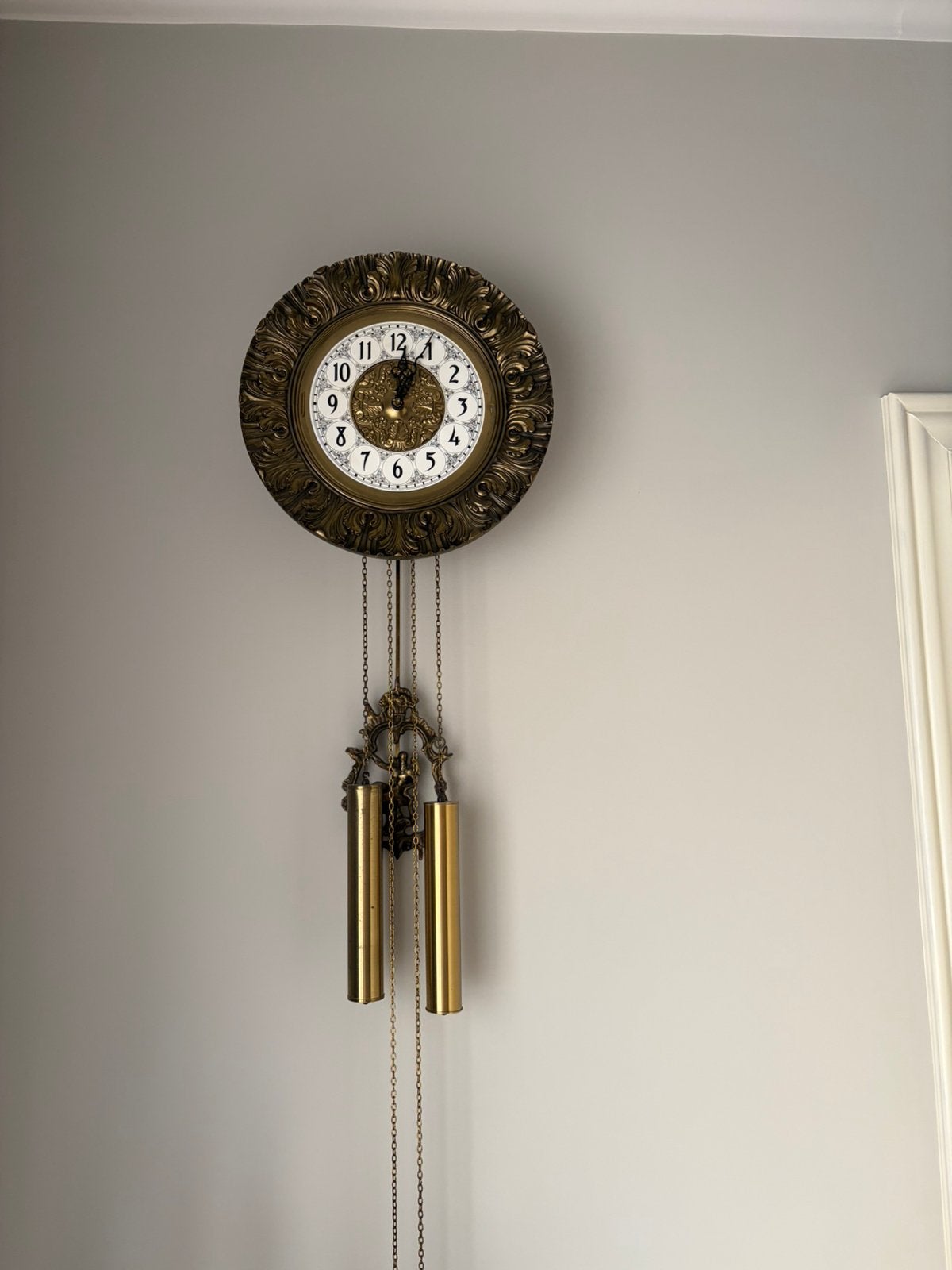 Wandklok met slinger en gewichten, Ophalen
