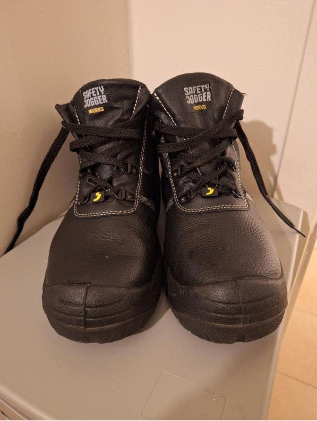 Werkschoenen met stalen tip, Enlèvement