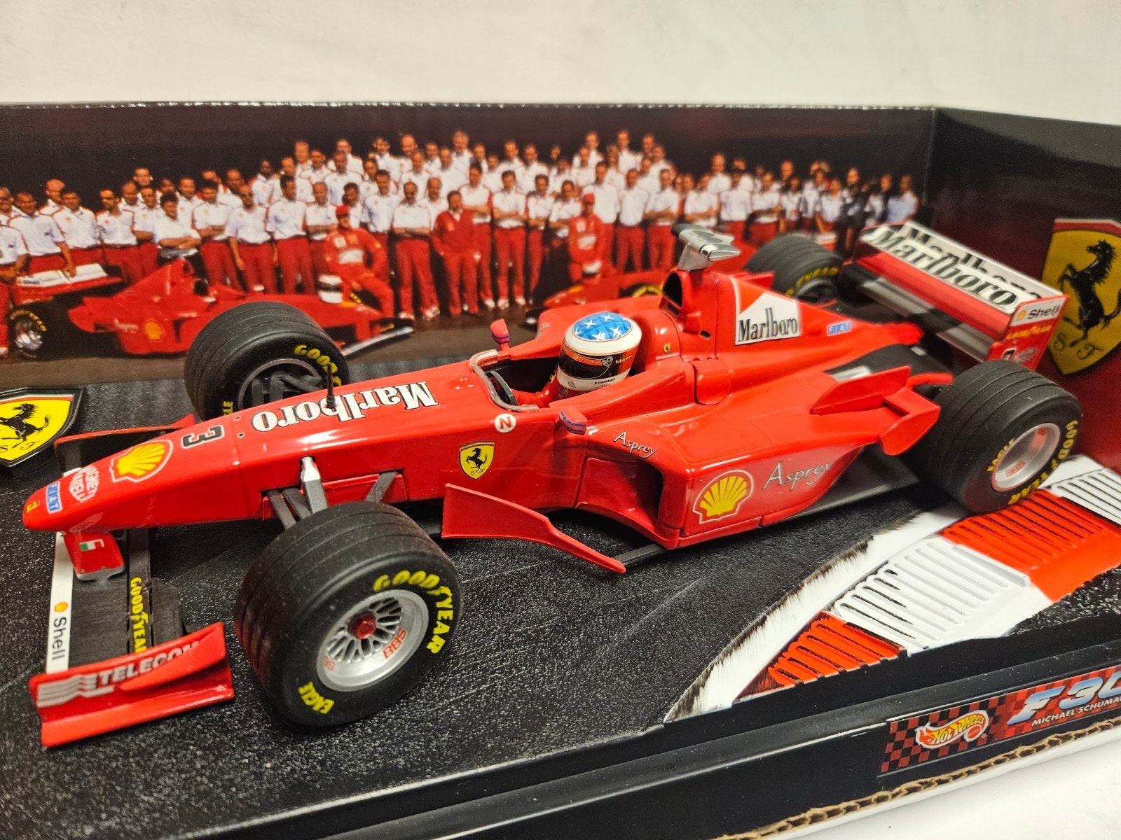 Ferrari F300 (1998) – Michael Schumacher – 1:18 Hot Wheels R, Hobby en Vrije tijd, Ophalen of Verzenden, Zo goed als nieuw, Auto