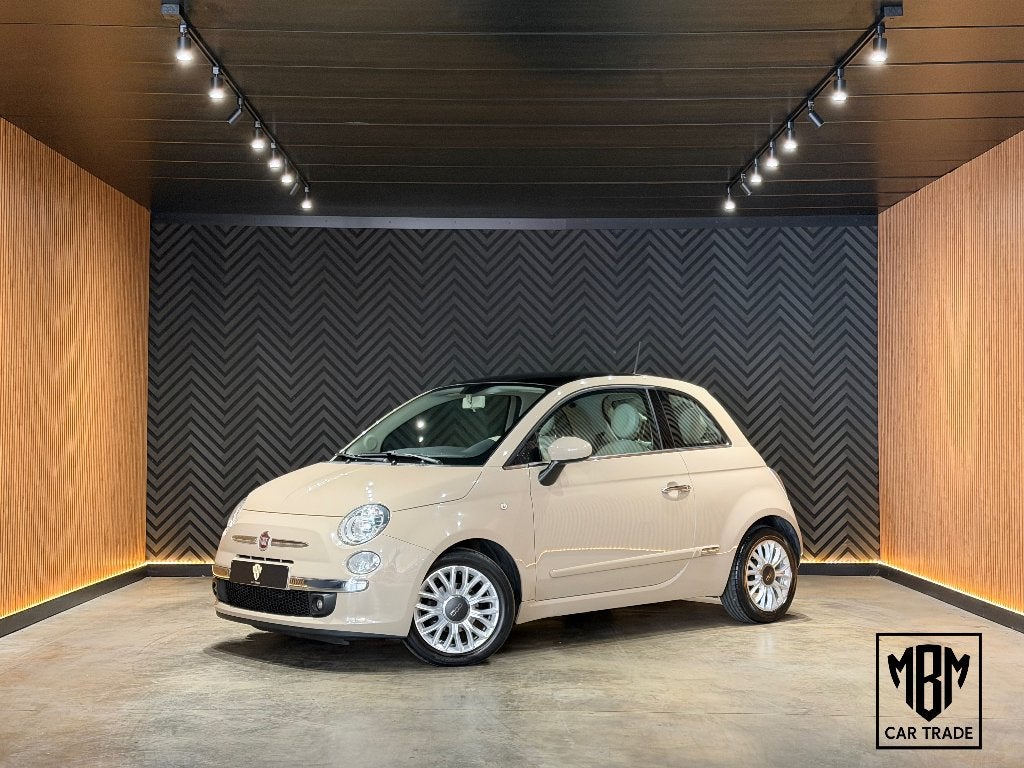 ✅Fiat 500 1.2i Lounge 12 Maanden GARANTIE Pano Airco Parksen, Auto's, Voorwielaandrijving, Stof, 4 cilinders, Beige