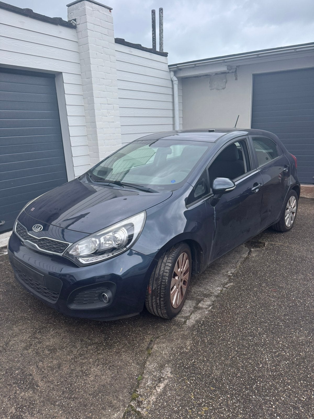Kia Rio 1.4 benzine 2012, Auto's, Kia, Euro 5, Blauw, Handgeschakeld, 5 deurs