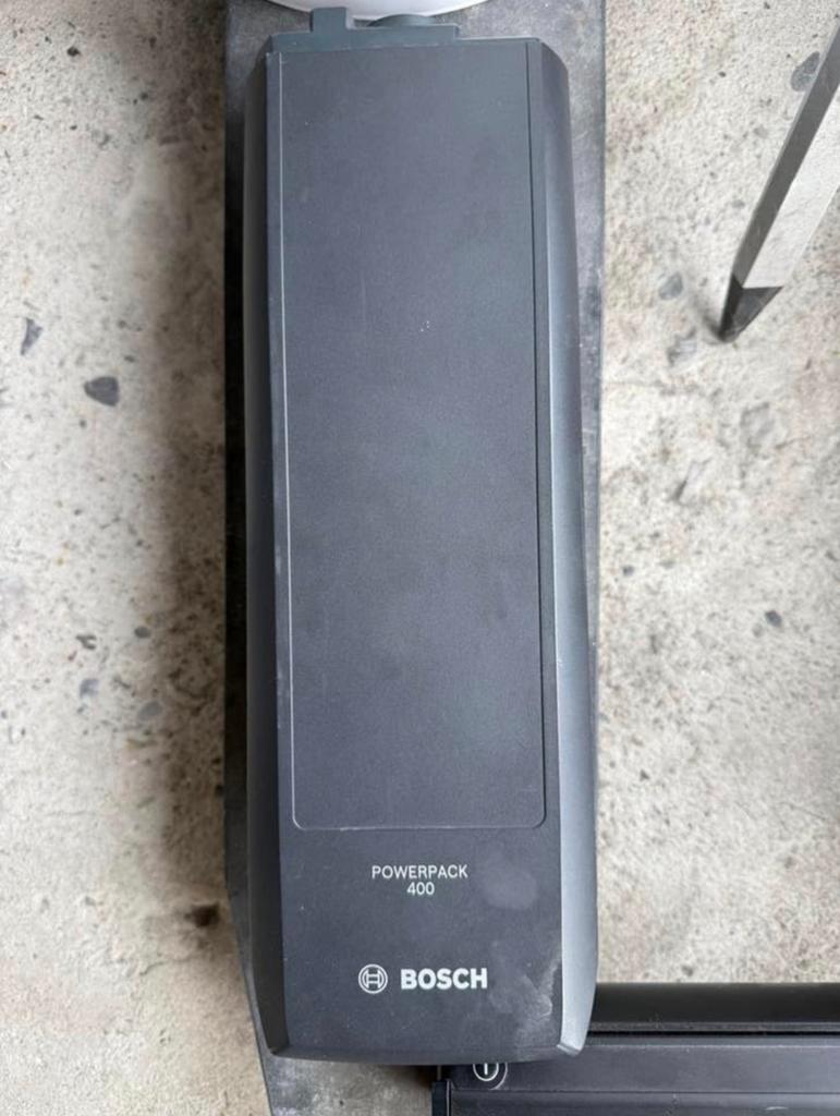 Defecte Bosch batterij pakdrager/powertube, Ophalen, Gebruikt