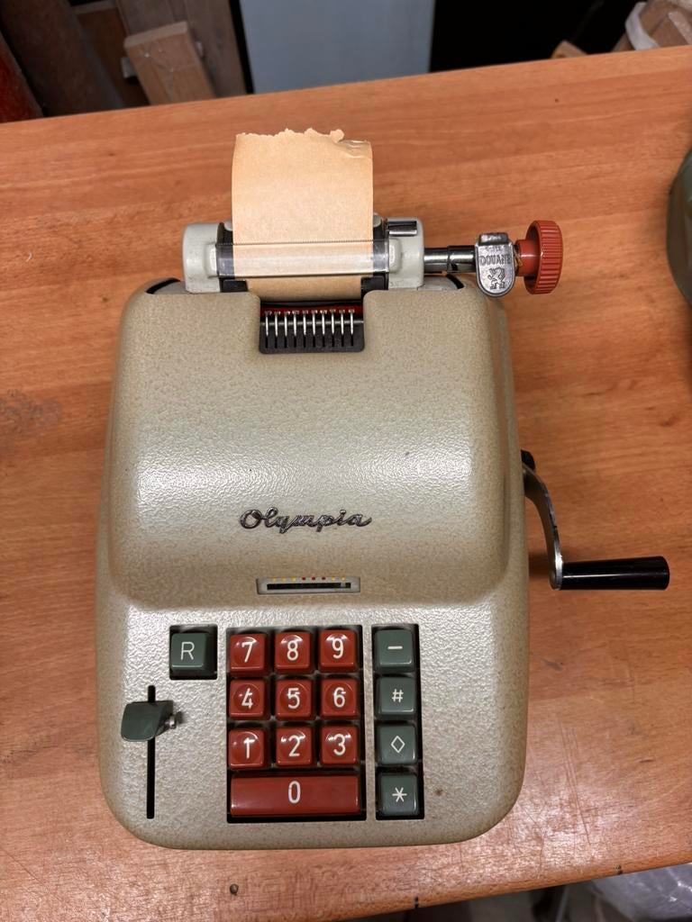 Olympia rekenmachine, Ophalen