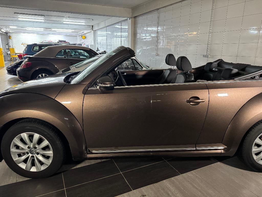 Volkswagen New Beetle metaalbruin Cab 1.2 TSI, Voorwielaandrijving, Beetle (Kever), 4 cilinders, Handgeschakeld