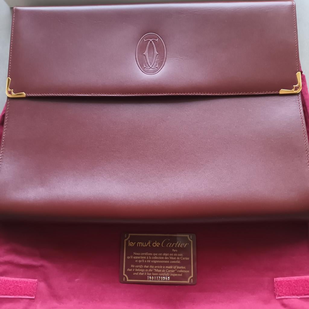 Cartier aktetas 38 cm op 27 cm bordeau in originele zak/doos, Handtassen en Accessoires, Portemonnees, Ophalen of Verzenden