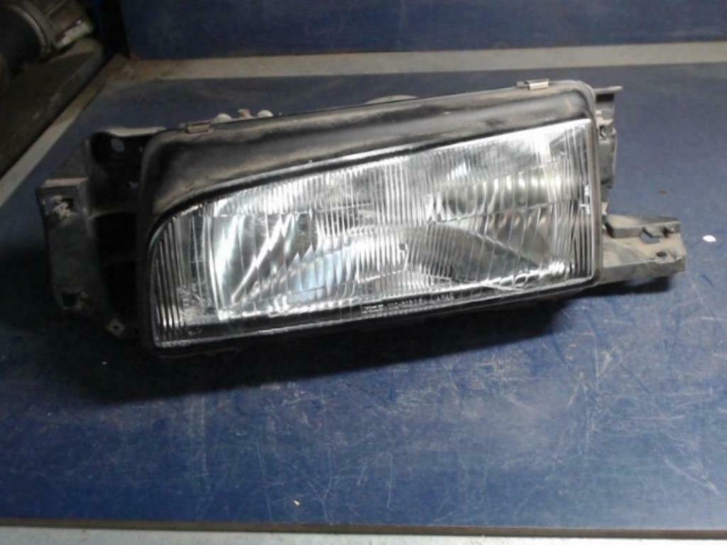 optique avant principal gauche Mazda 323 BG 1992, Autos : Pièces & Accessoires, Éclairage, Mazda, Utilisé, Enlèvement