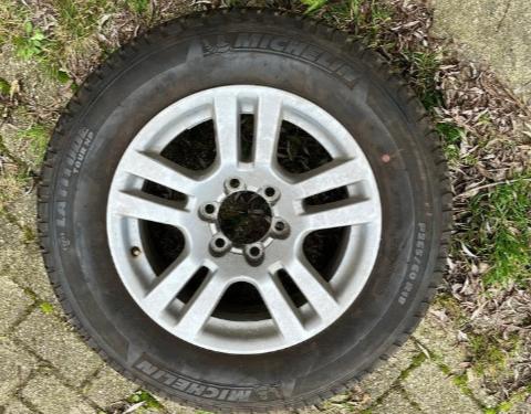 Toyota 200 velg met band sport, nieuw 265/60R18, Ophalen, 18 inch, Gebruikt, 265 mm