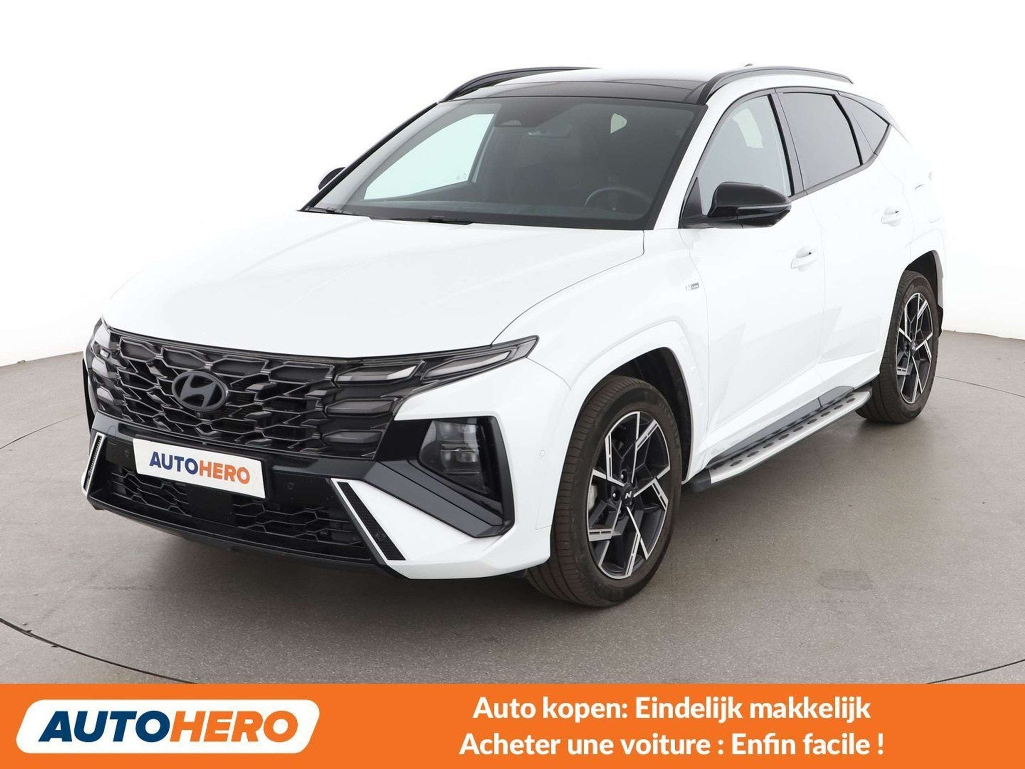Hyundai Tucson 1.6 T-GDI Hybrid N Line (bj 2025, automaat), Auto's, Gebruikt, Zwart, 1776 kg, Wit