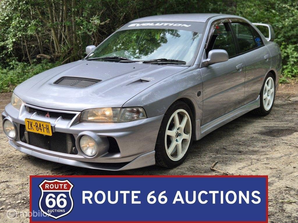 Mitsubishi Lancer Evolution IV GSR | 1996 | Route 66 Auction, Autos, Oldtimers & Ancêtres, Entreprise, Achat, Mitsubishi, Essence