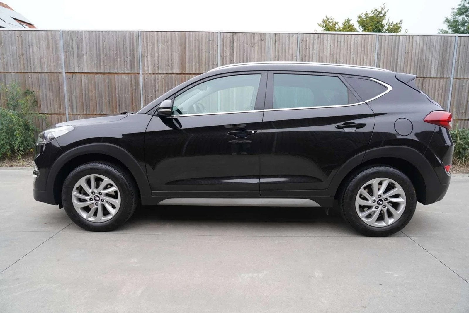 Hyundai Tucson 1.6 GDi 2WD Premium*1ste eig*Topstaat!, Auto's, Gebruikt, 4 cilinders, Zwart, Leder