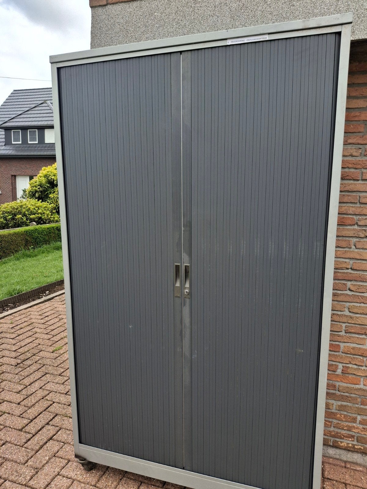Bureaukast, of opbergkast, Ophalen