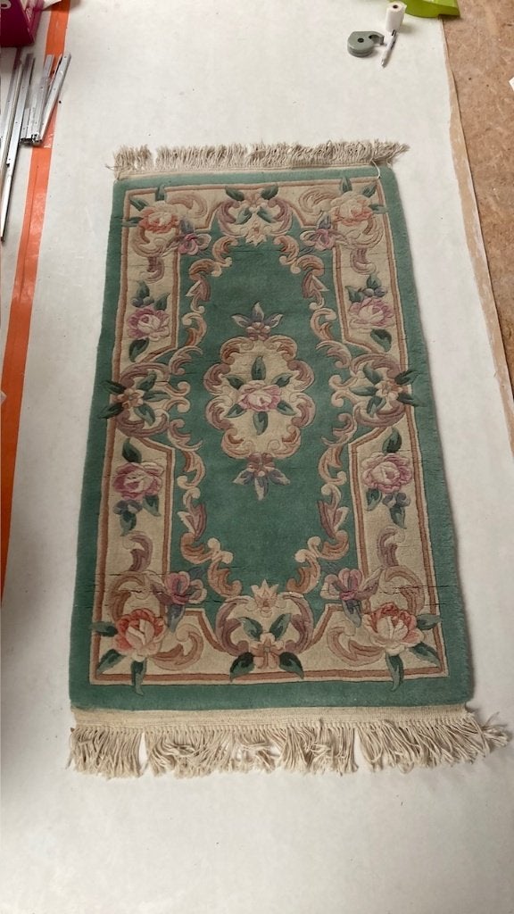 Wollen vloerkleed, Ophalen