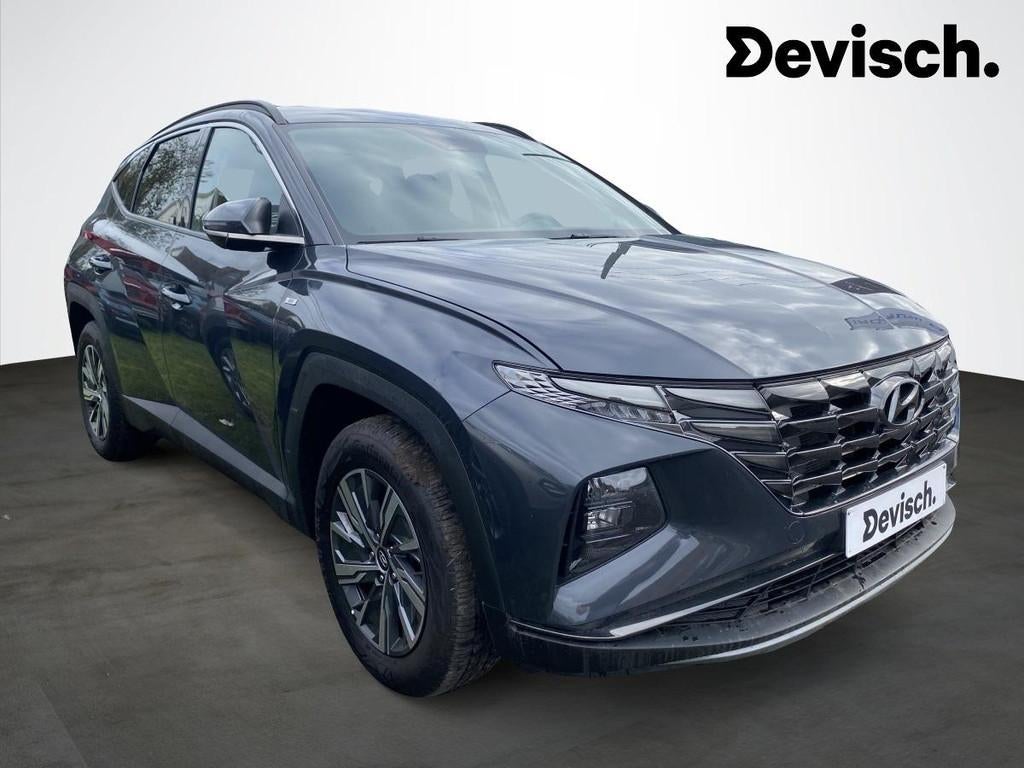 Hyundai Tucson 1.6 T-GDi DCT LIMITED EDITION MILD HYBRID 48V, Auto's, Hyundai, Stof, Gebruikt, 4 cilinders, Parkeersensor