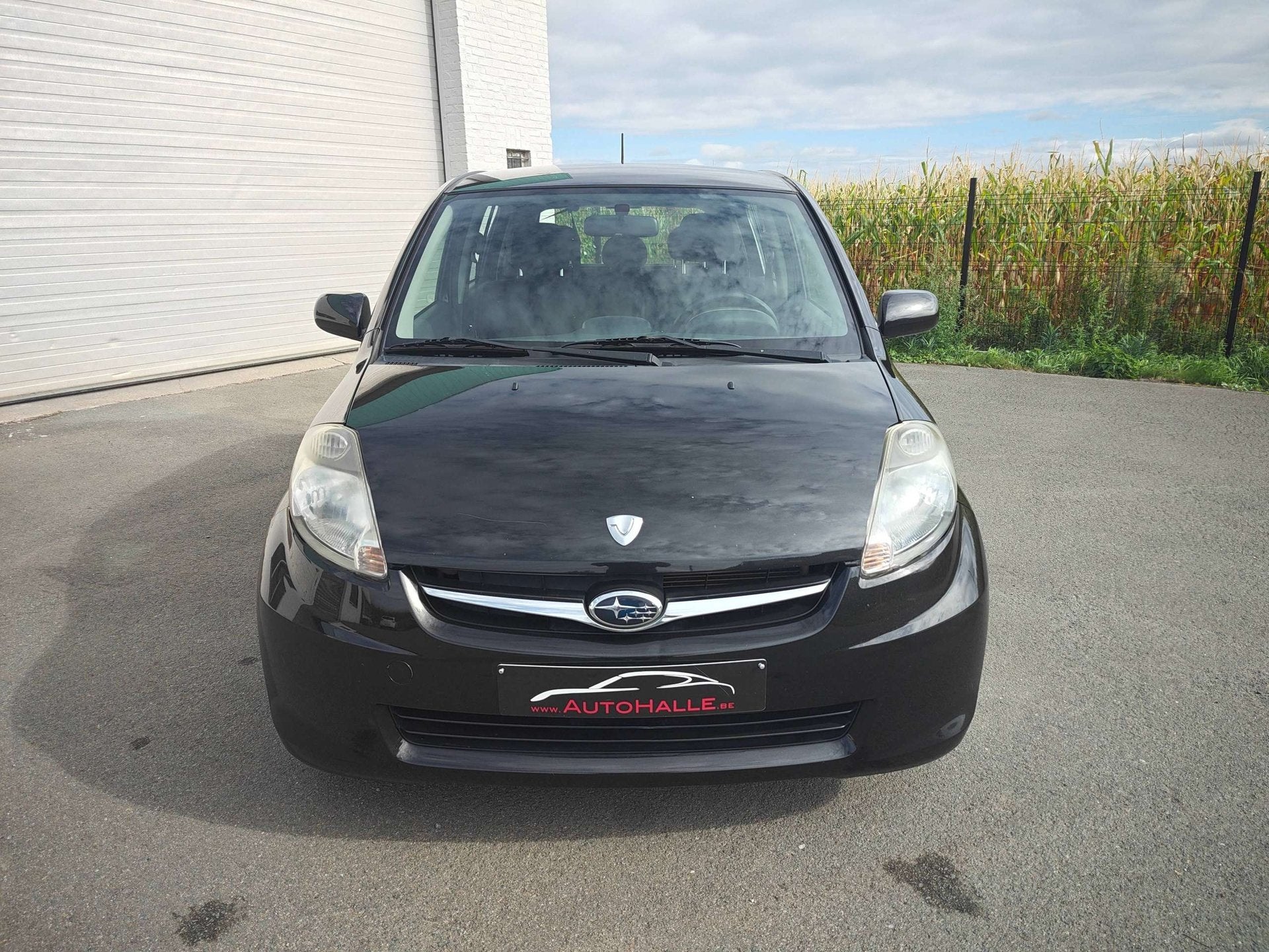 Subaru Justy Justy 1.0i Comfort benzine/essence - AIRCO - 5, Auto's, Stof, Gebruikt, 965 kg, Zwart