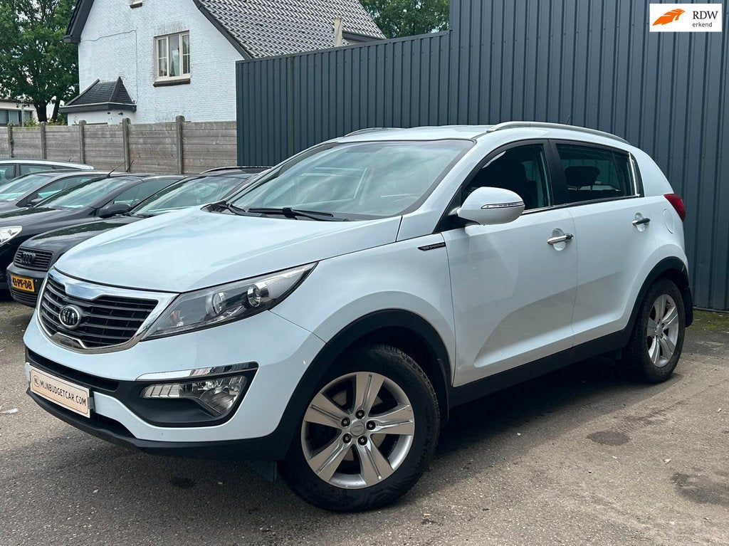 Kia Sportage 2.0 X-ecutive Automaat Plus Pack, Auto's, Gebruikt, 4 cilinders, Leder en Stof, Wit