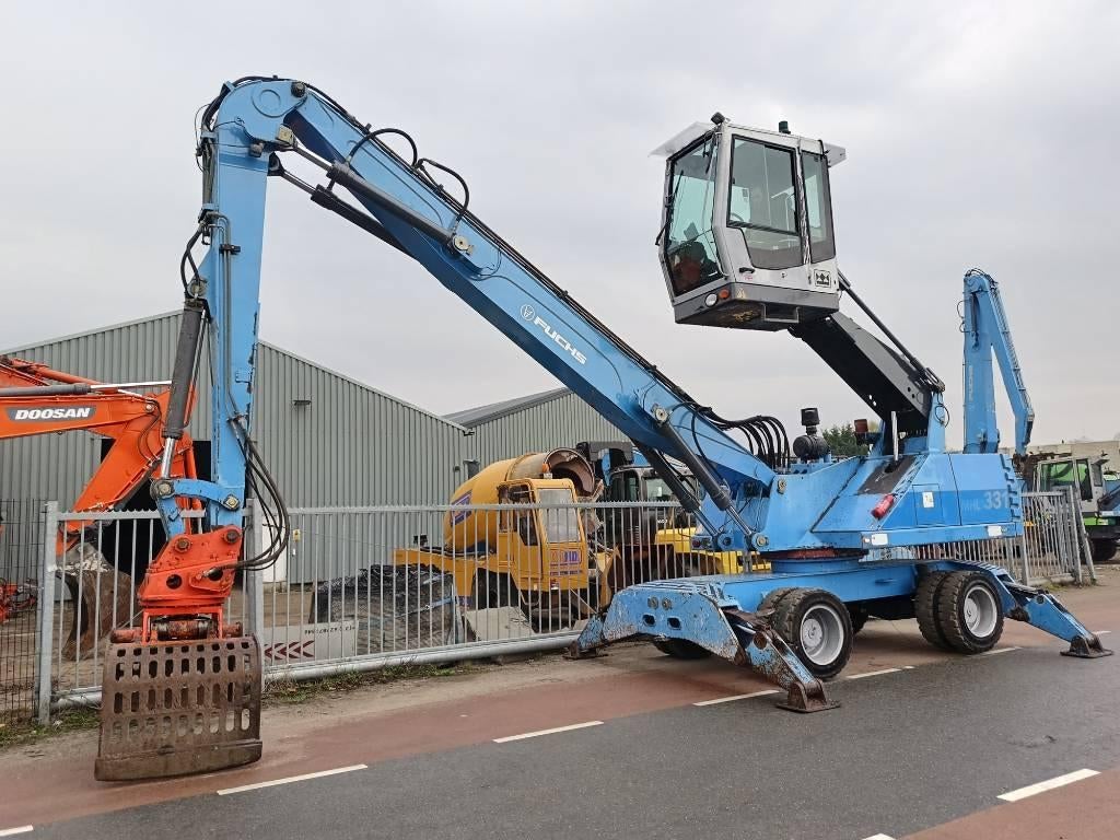 Fuchs MHL 331 overslagkraan umslagbagger waste handler, Grue