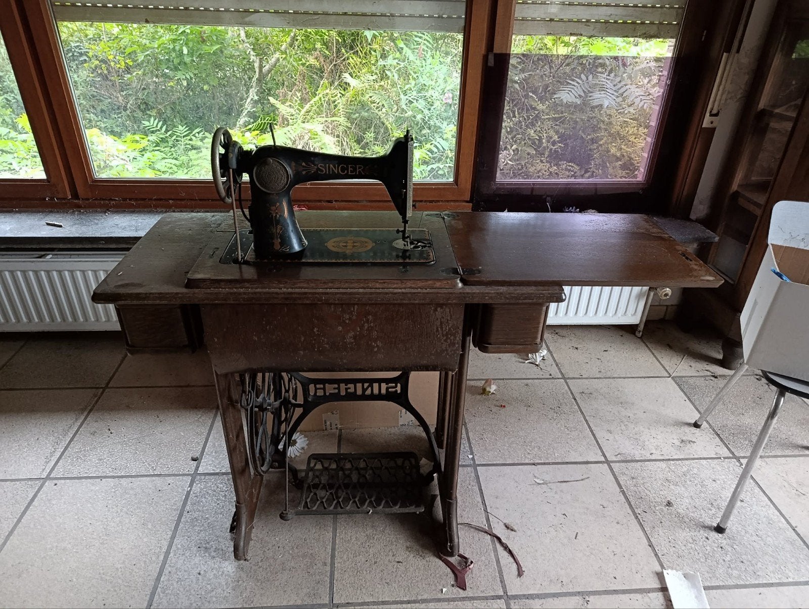 singer naaimachine, Ophalen