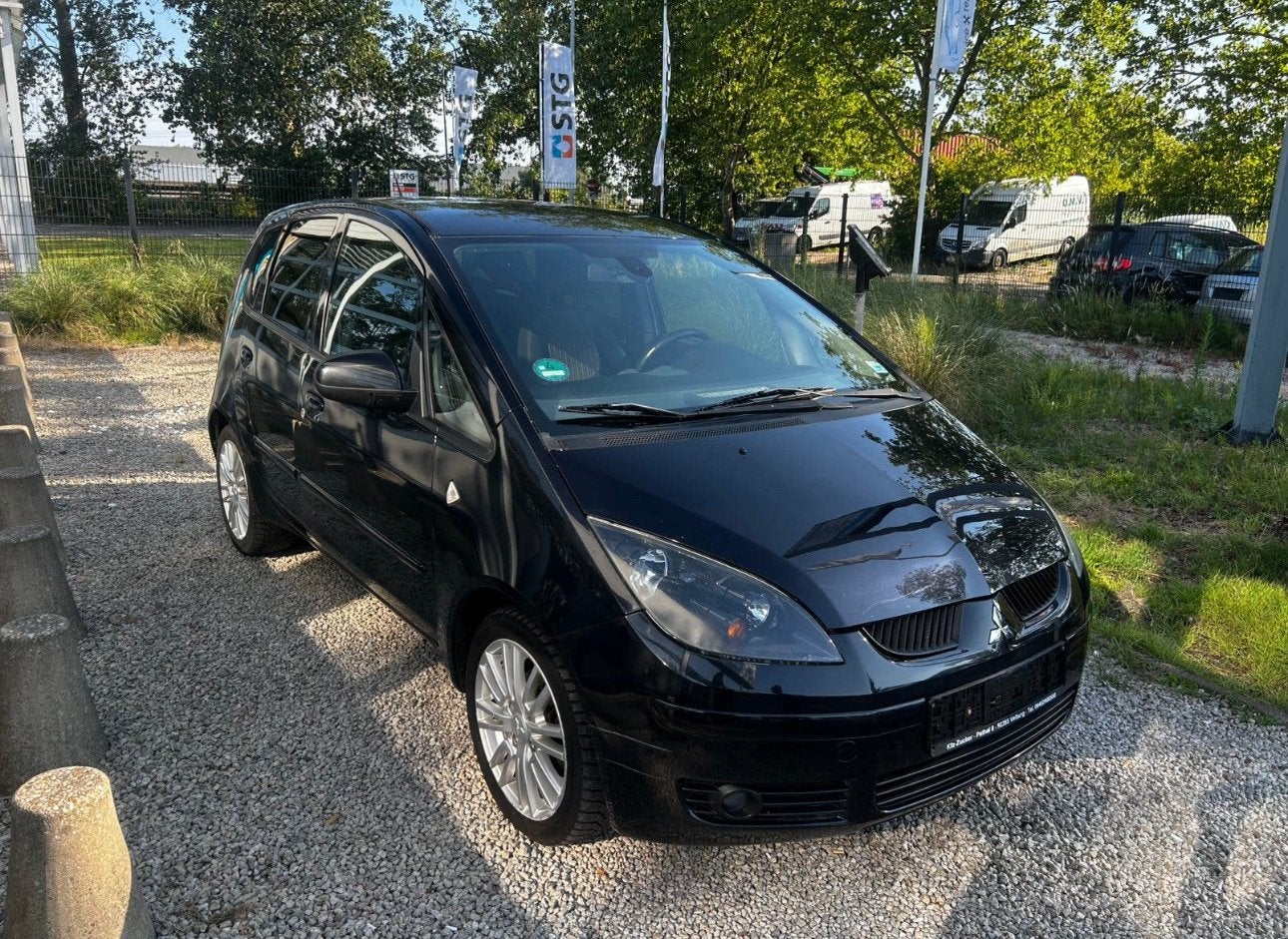 Mitsubitchi colt benzine met keuring verkoop en garantie, Auto's, Voorwielaandrijving, Stof, Zwart, 4 cilinders