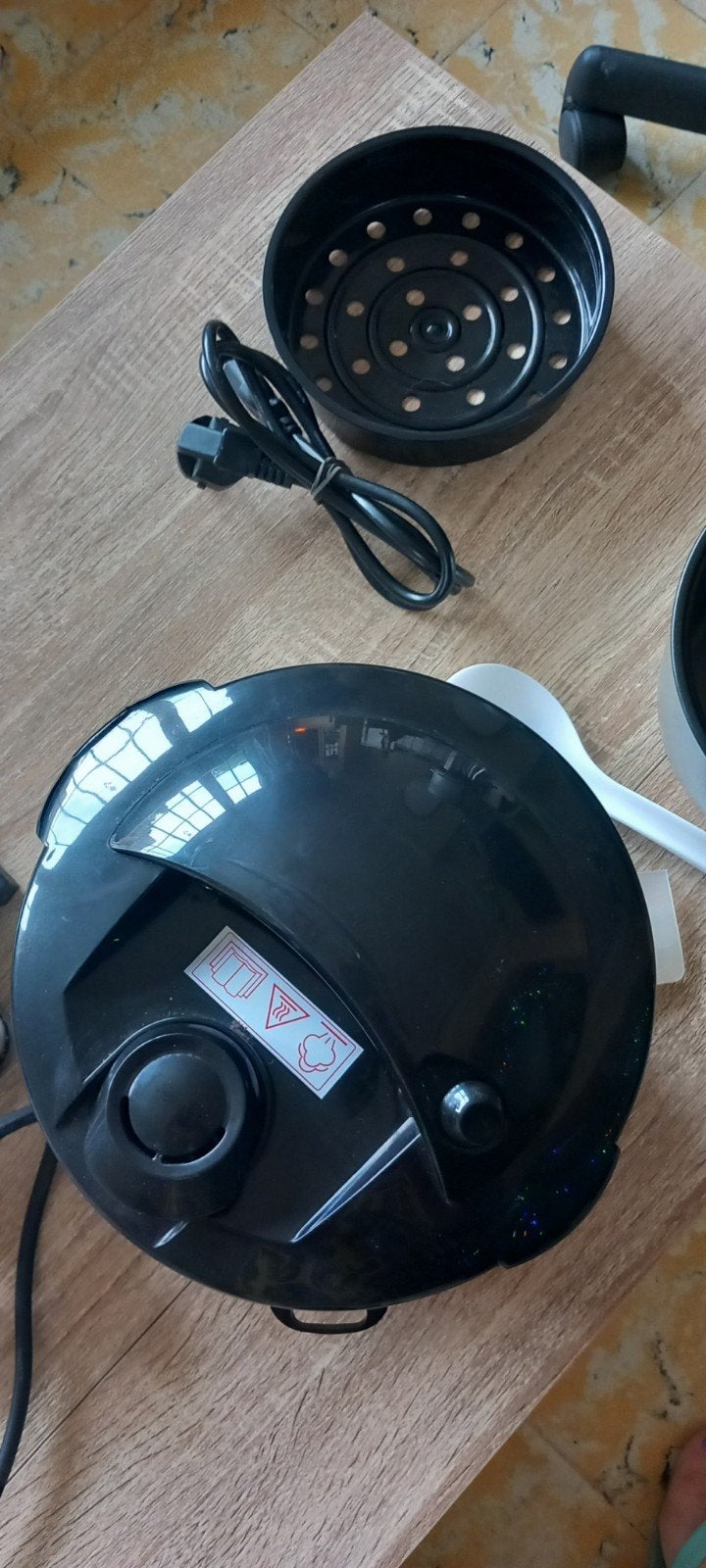 Rijstkoker, Ophalen