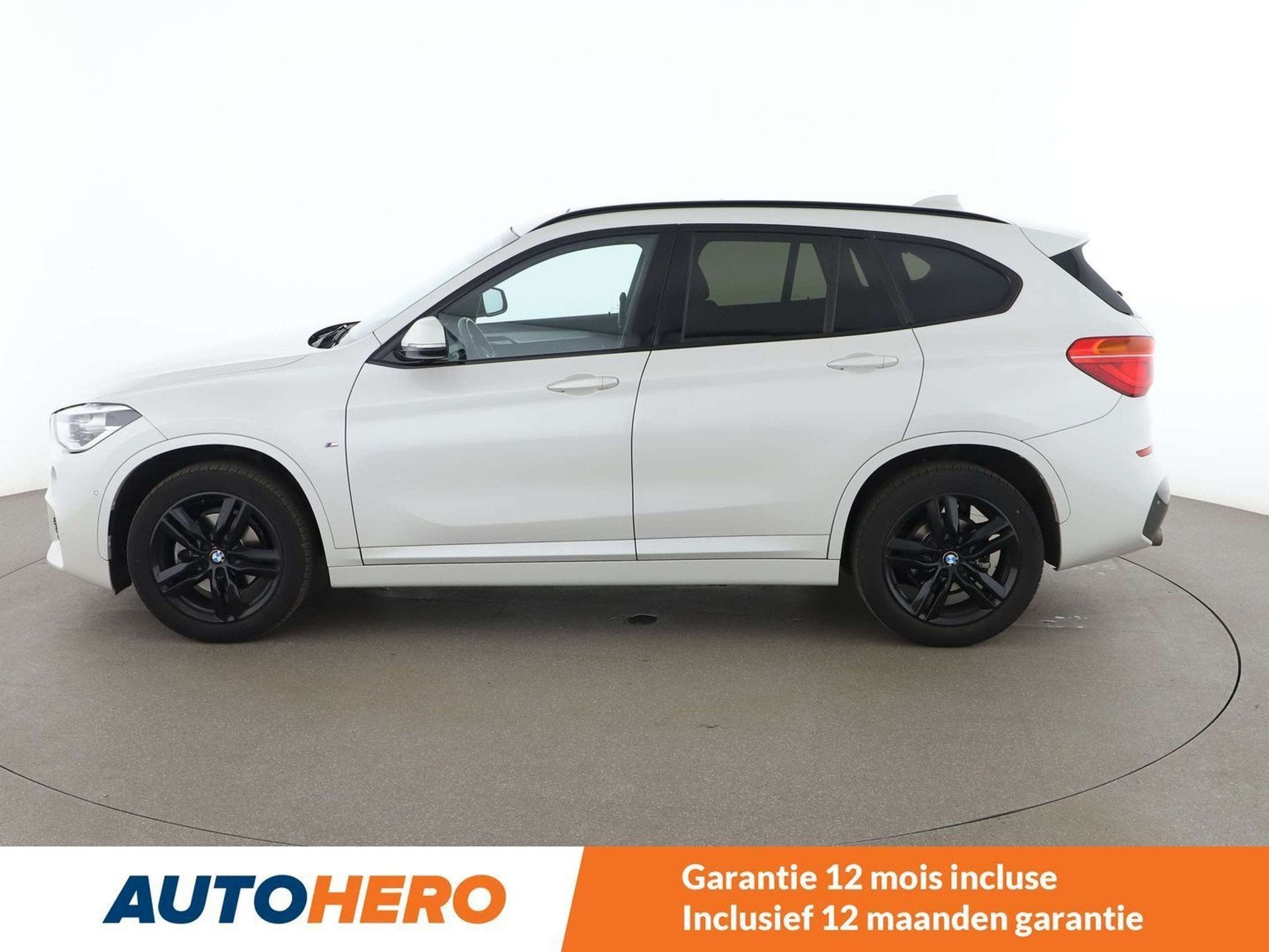 BMW X1 sDrive 18i M Sport (bj 2019, automaat), Auto's, Gebruikt, 1505 kg, Wit, Leder