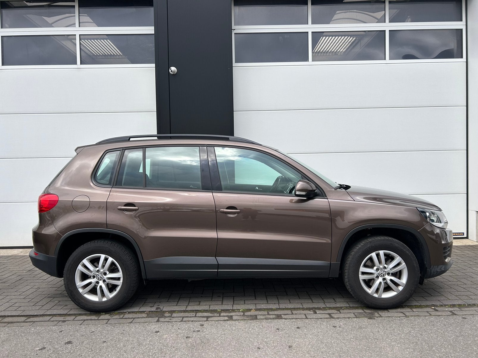Volkswagen Tiguan 1.4 TSI BlueMotion perfecte staat, Auto's, Volkswagen, Euro 5, Stof, Zwart, Bruin