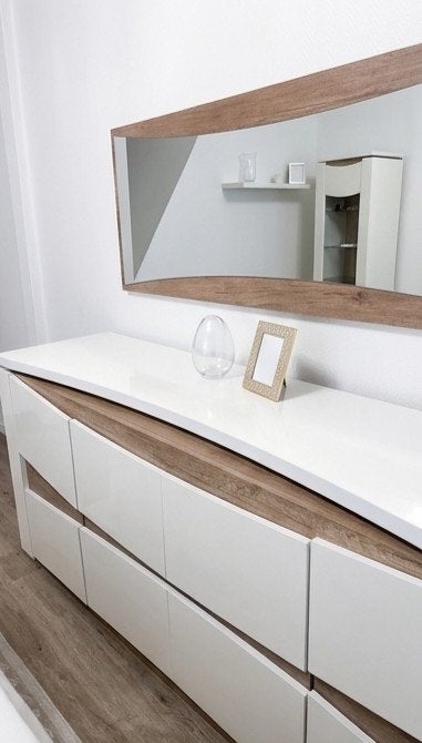 Dressoir en spiegel, Ophalen