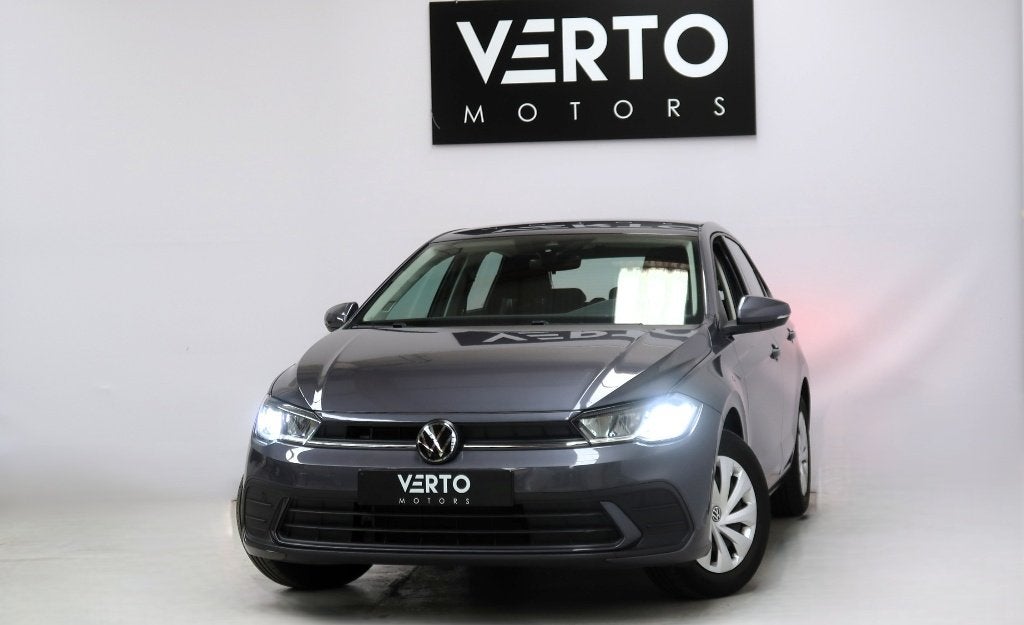 Volkswagen Polo TSI DSG, Auto's, Stof, 5 deurs, 3 cilinders, Zilver of Grijs