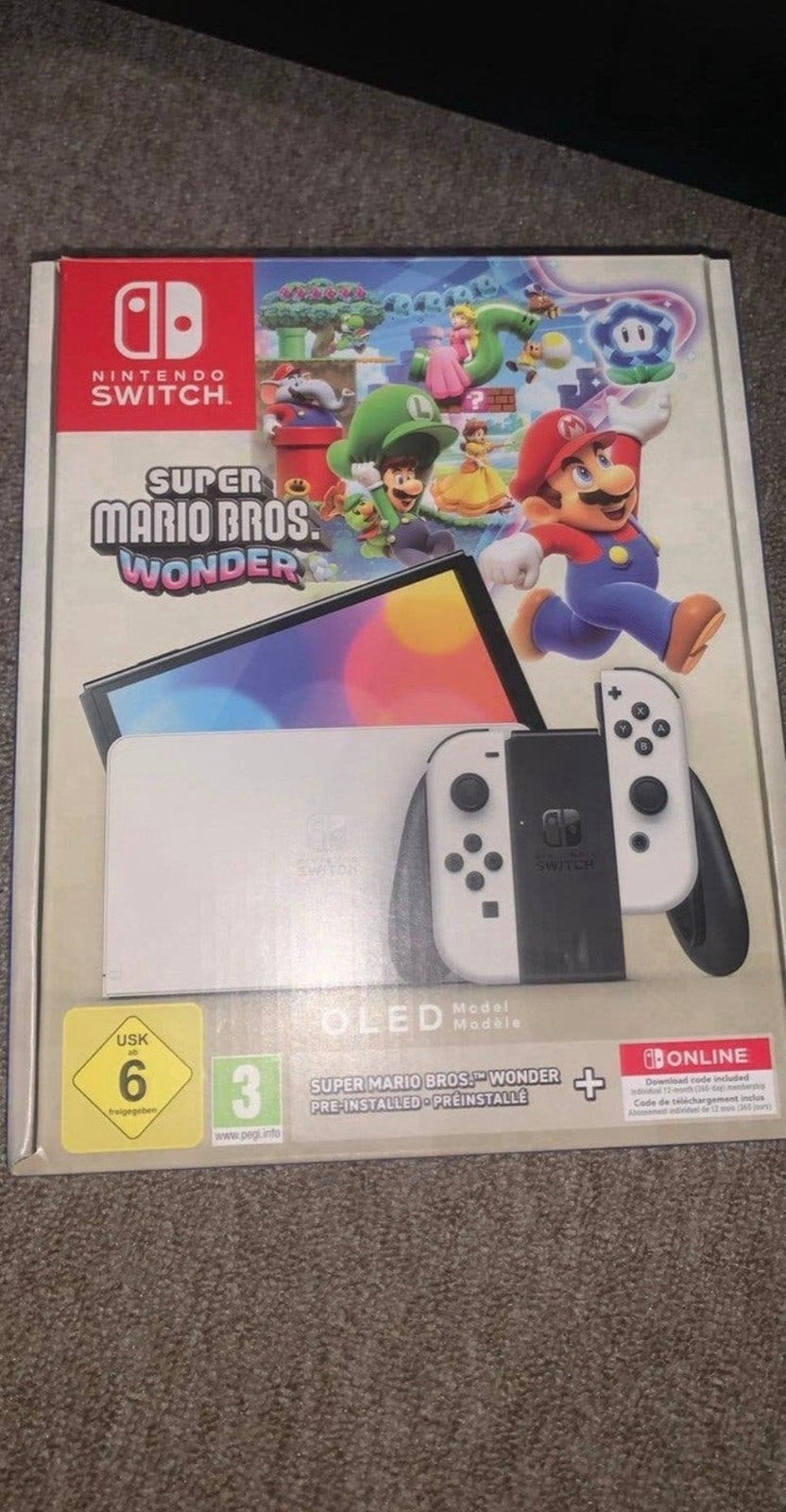 Nintendo Switch OLED comme neuve, Enlèvement, Comme neuf, Avec 2 manettes, Switch OLED