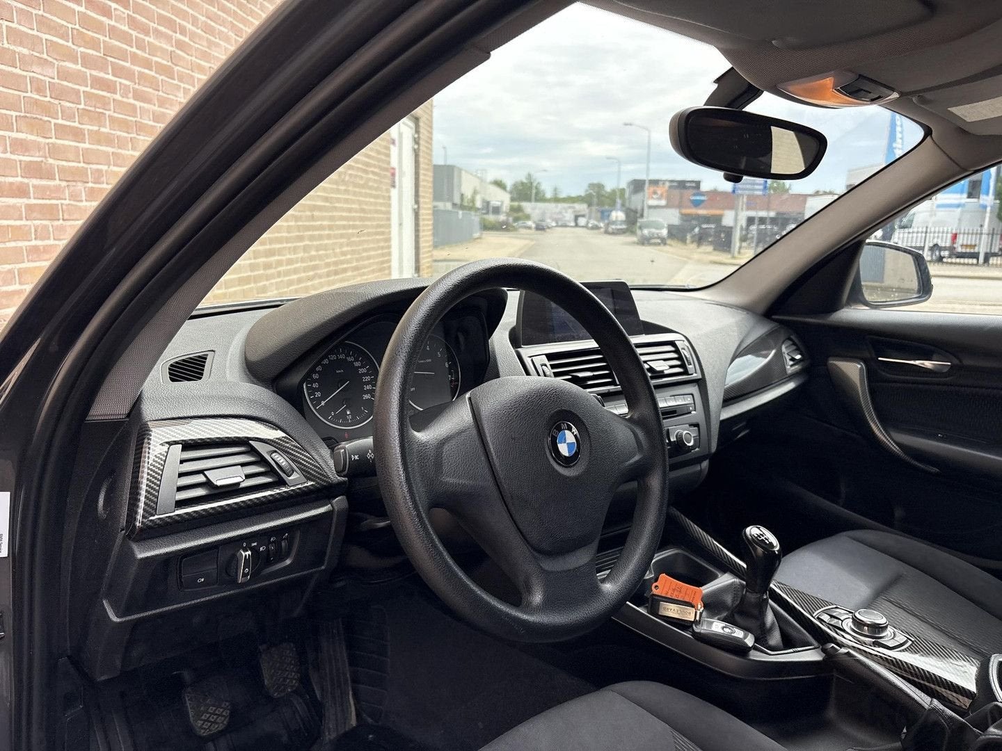 BMW 114 1-serie 114i EDE | Airco | Navi | PDC |, Auto's, Start-stop-systeem, 1 Reeks, 129 g/km, Zilver of Grijs