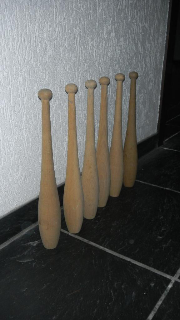 6 houten kegels, Ophalen