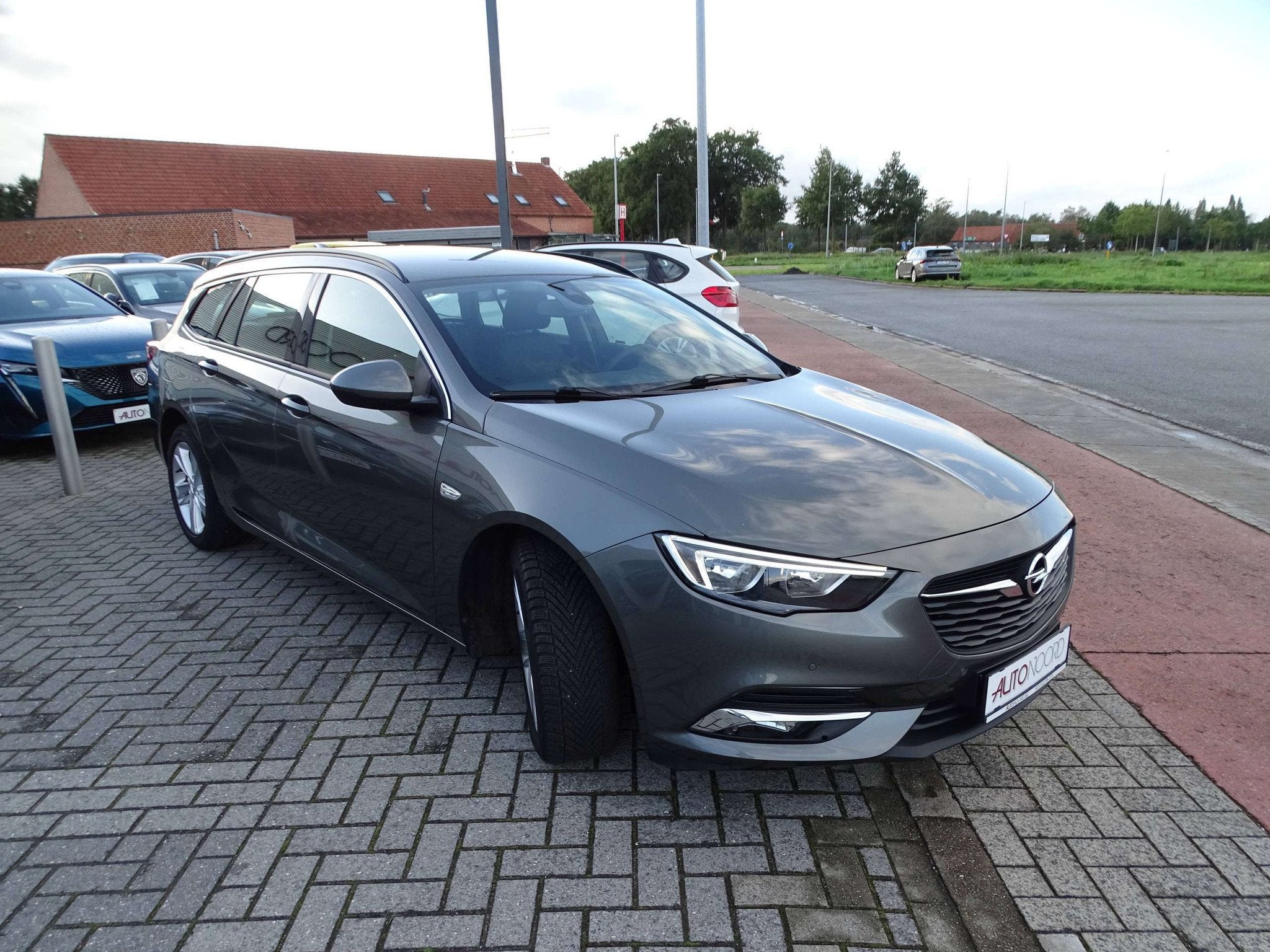 Opel Astra Astra 1.2 Turbo Ultimate * TREKHAAK * TOPSTAAT!, Autos, Argent ou Gris, Achat, Entreprise, Ordinateur de bord