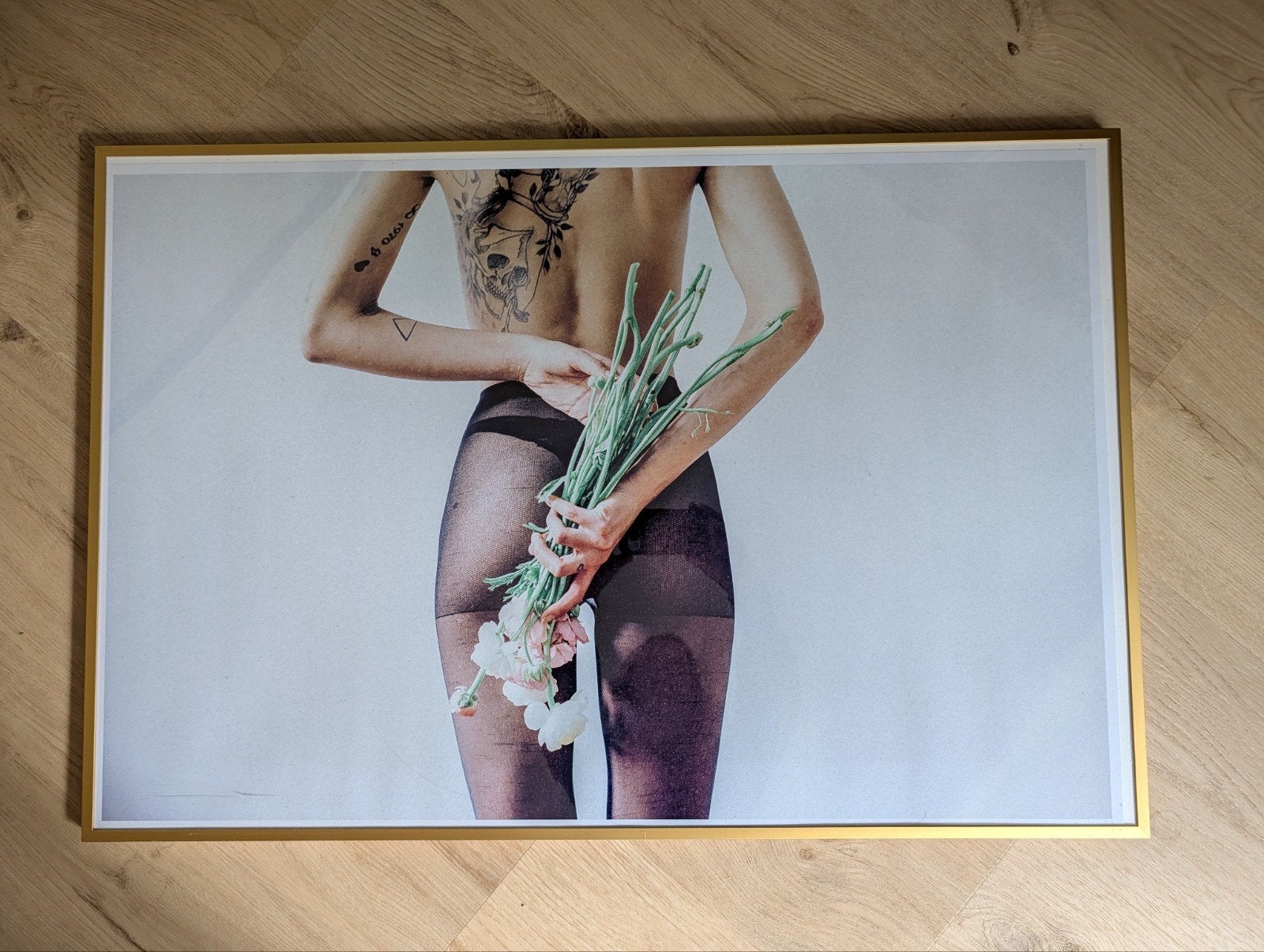 Gouden kader met poster, Ophalen