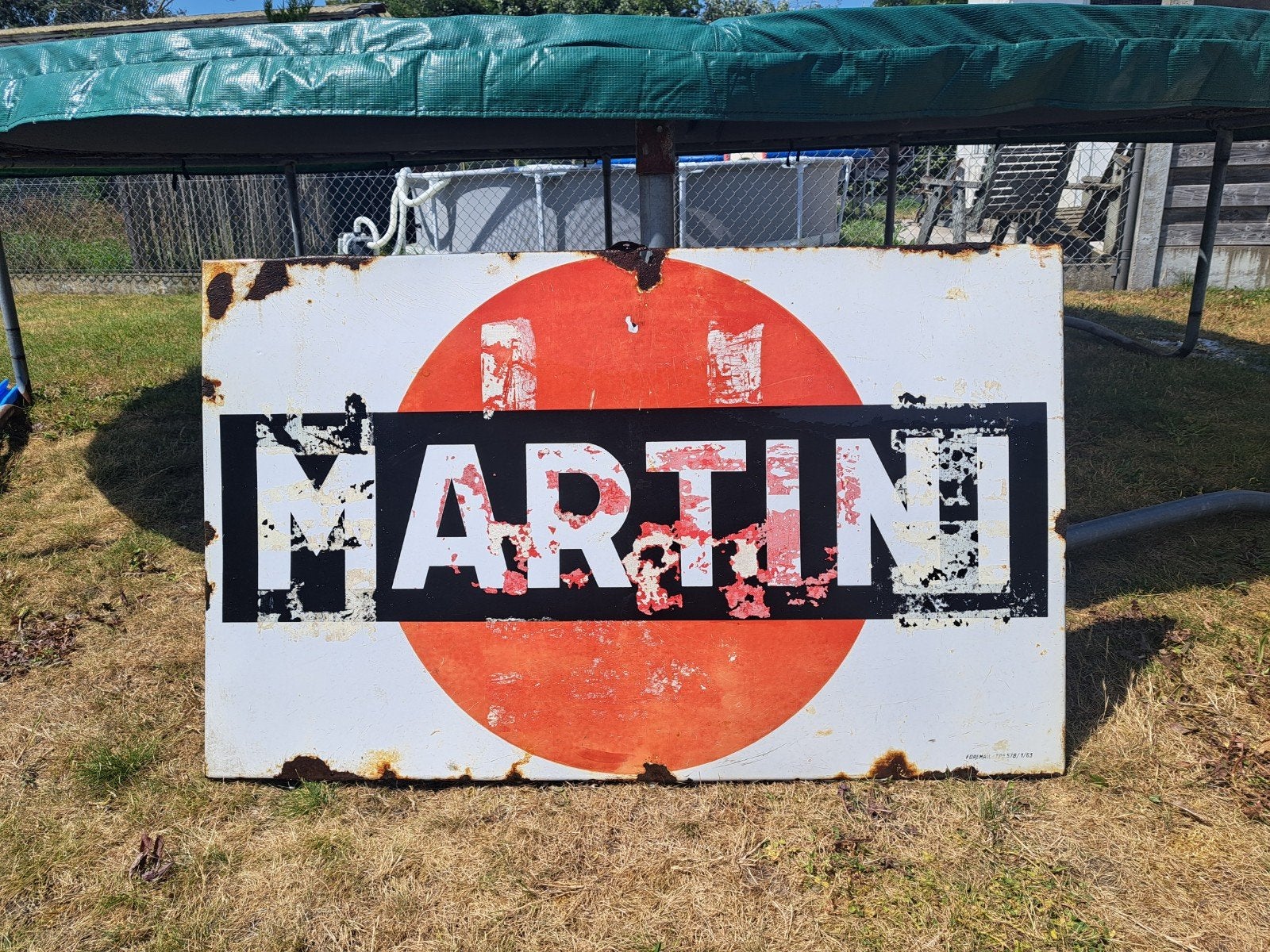 Emaille reclame Martini, Ophalen