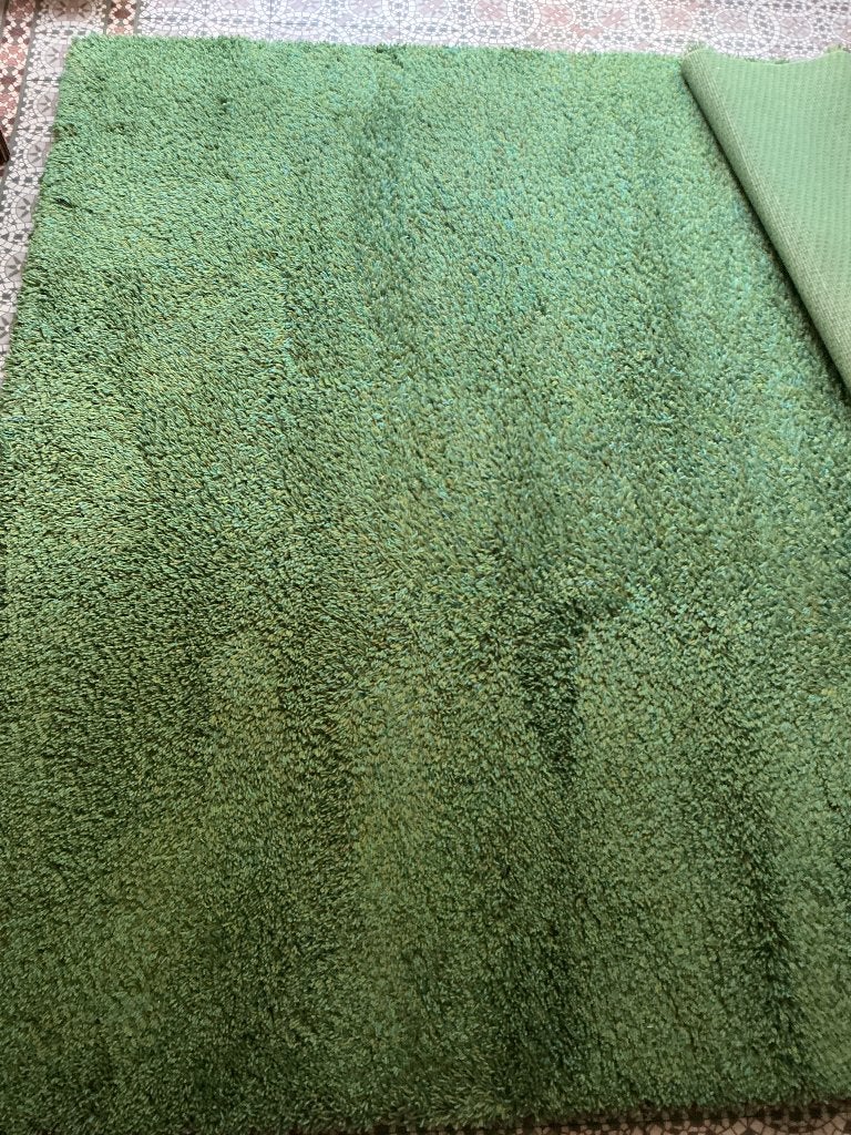 Tapis 100% laine, Enlèvement