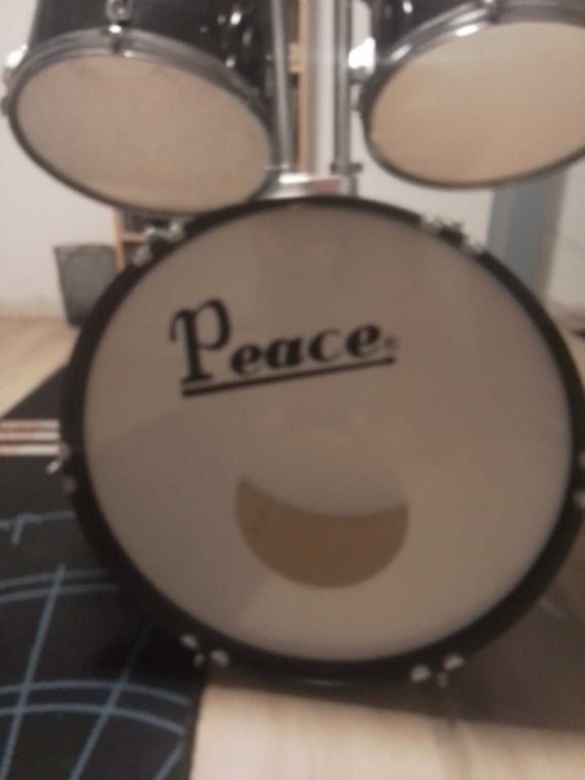 Drumstel peace, Ophalen