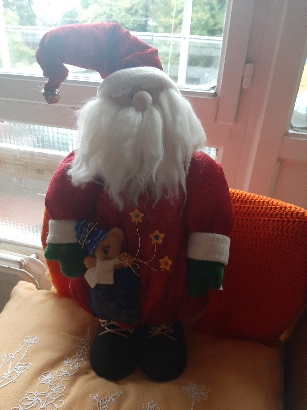 kerstman dat zingt en rode ster lichtjes, Ophalen