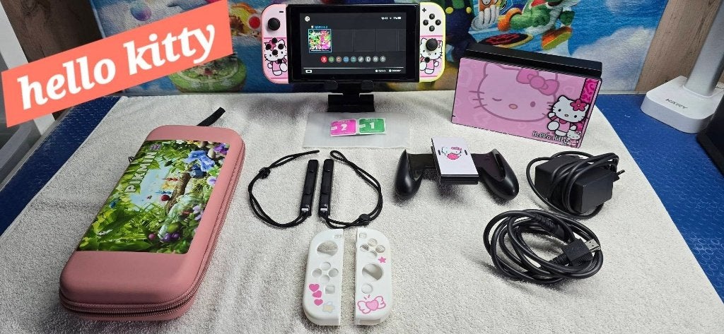 console nintendo switch custom hello kitty + jeu & garantie, Consoles de jeu & Jeux vidéo, Enlèvement ou Envoi, Comme neuf