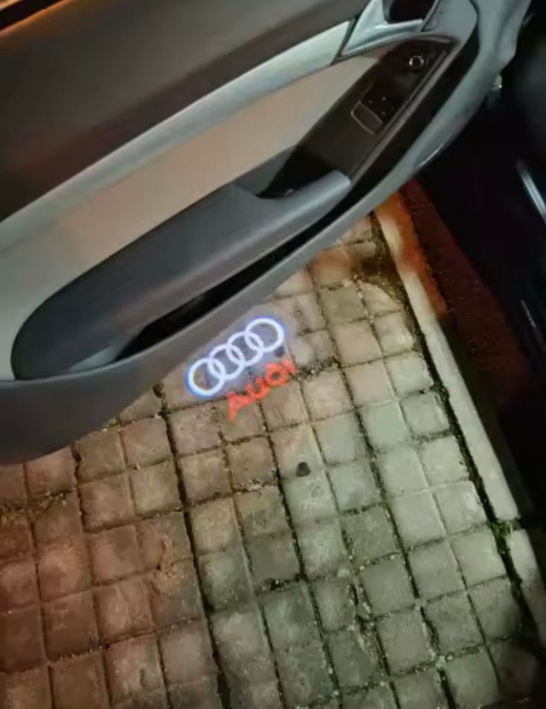 Paire de projecteurs LED porte Audi, Autos : Divers, Coffres de toit, Enlèvement ou Envoi, Comme neuf