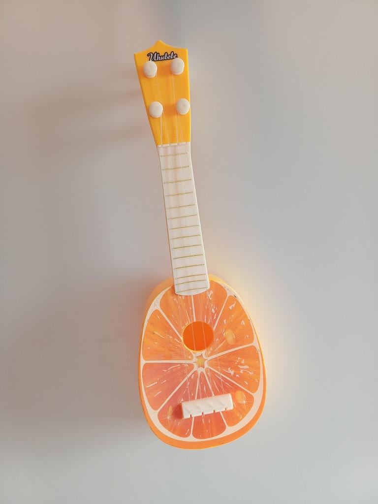 Orange kinder gitaar, Muziek en Instrumenten, Snaarinstrumenten | Overige, Ophalen of Verzenden, Zo goed als nieuw, Overige typen