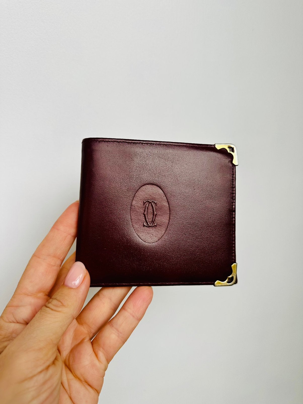 Vintage Must de Cartier portefeuille in bordeauxrood, Handtassen en Accessoires, Gebruikt, Overige kleuren, Leder, Ophalen