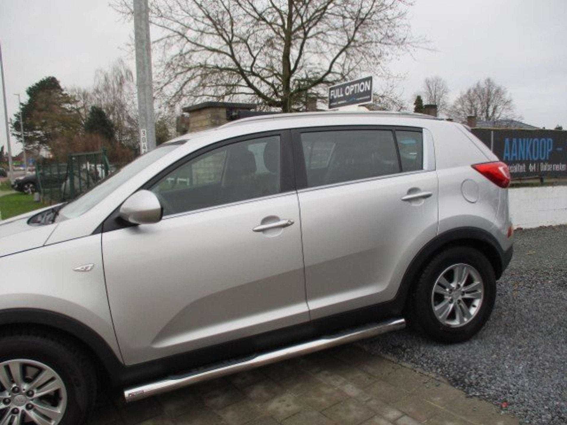 Kia Sportage 1.6i 2WD DYNAMIQUE ISG AIRCO ALU PDC TOPSTAAT 1, Auto's, Stof, Gebruikt, 149 g/km, Bedrijf