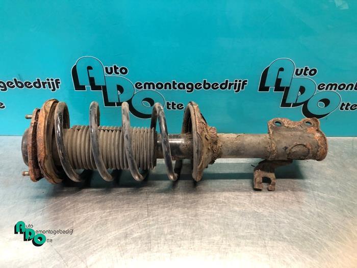 Schokdemperpoot rechts-voor van een Nissan 100 NX (100 NX 91, Auto-onderdelen, Gebruikt, -, -, Ophalen of Verzenden