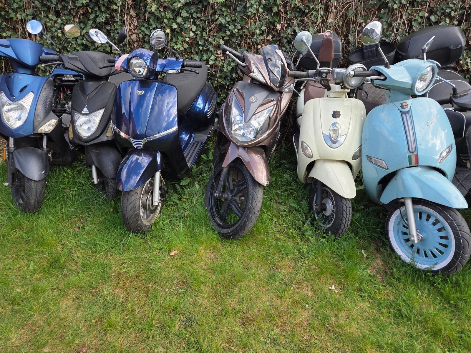 lot 37 scooters voor export of onderdelen, Enlèvement