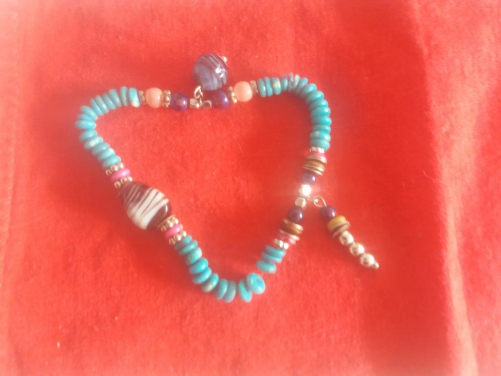 Mooi armbandje Turquoise, Overige kleuren, Ophalen of Verzenden, Zo goed als nieuw, Elastiek