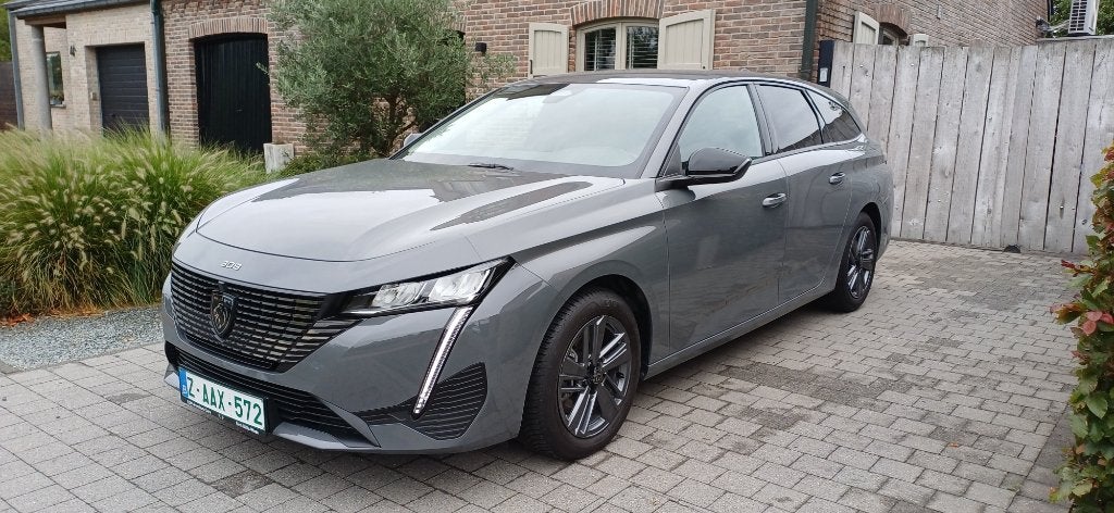 Peugeot 308 SW 131pk / Allure / garantie - Promo, Auto's, 1199 cc, Parkeersensor, Euro 6, Zwart