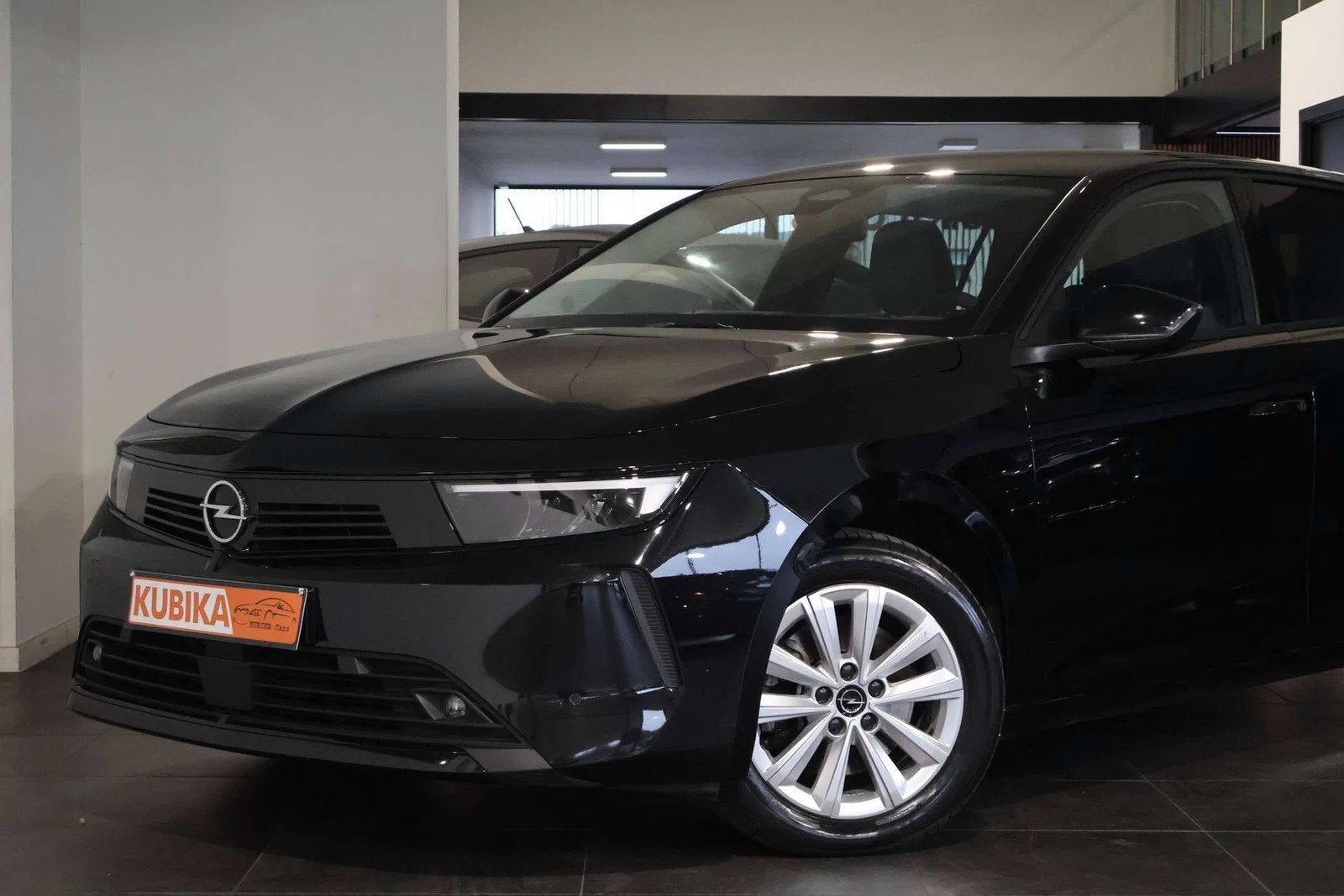 Opel Astra Astra Sports Tourer 1.2 Turbo LijnA Camera Garaan, Auto's, Stof, Gebruikt, 1199 cc, Zwart