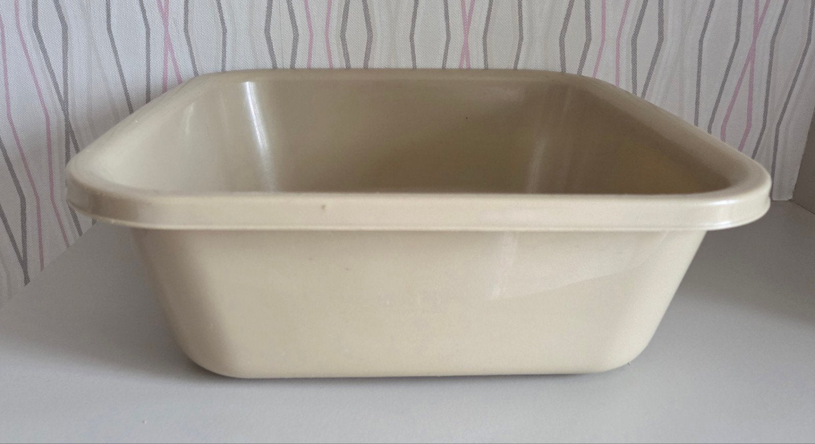 plastiek afwasbak, Ophalen