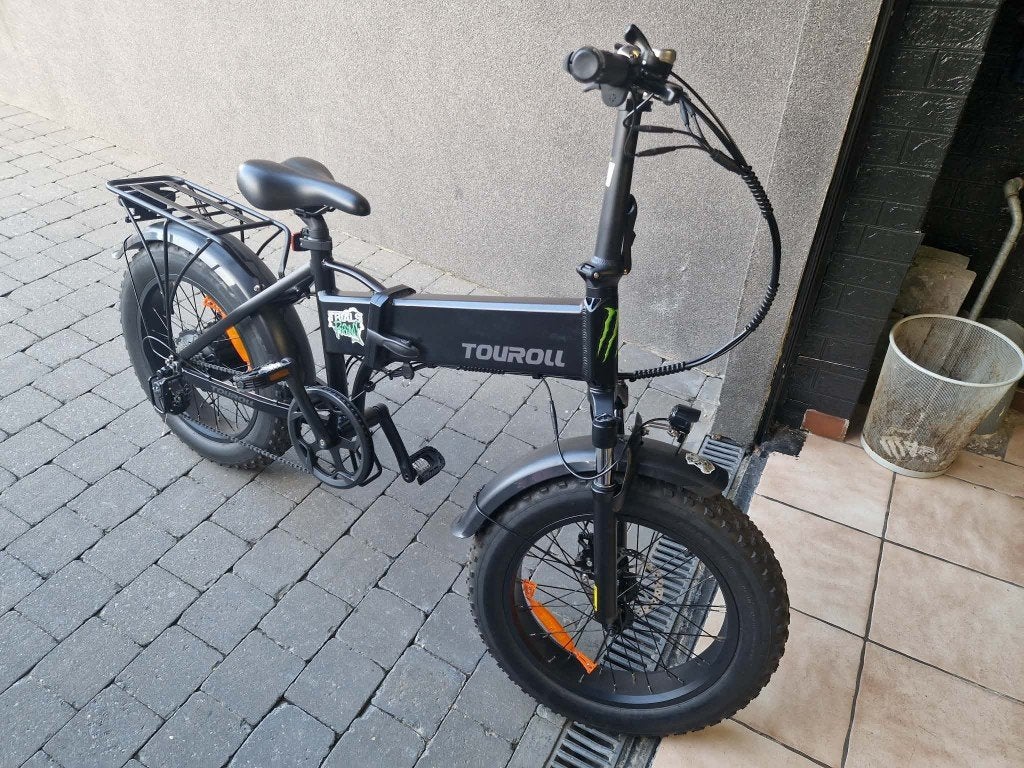 Vélo électrique de type " FAT bike " " Touroll " état neuf, Enlèvement, Comme neuf, 50 km par batterie ou plus, Autres marques