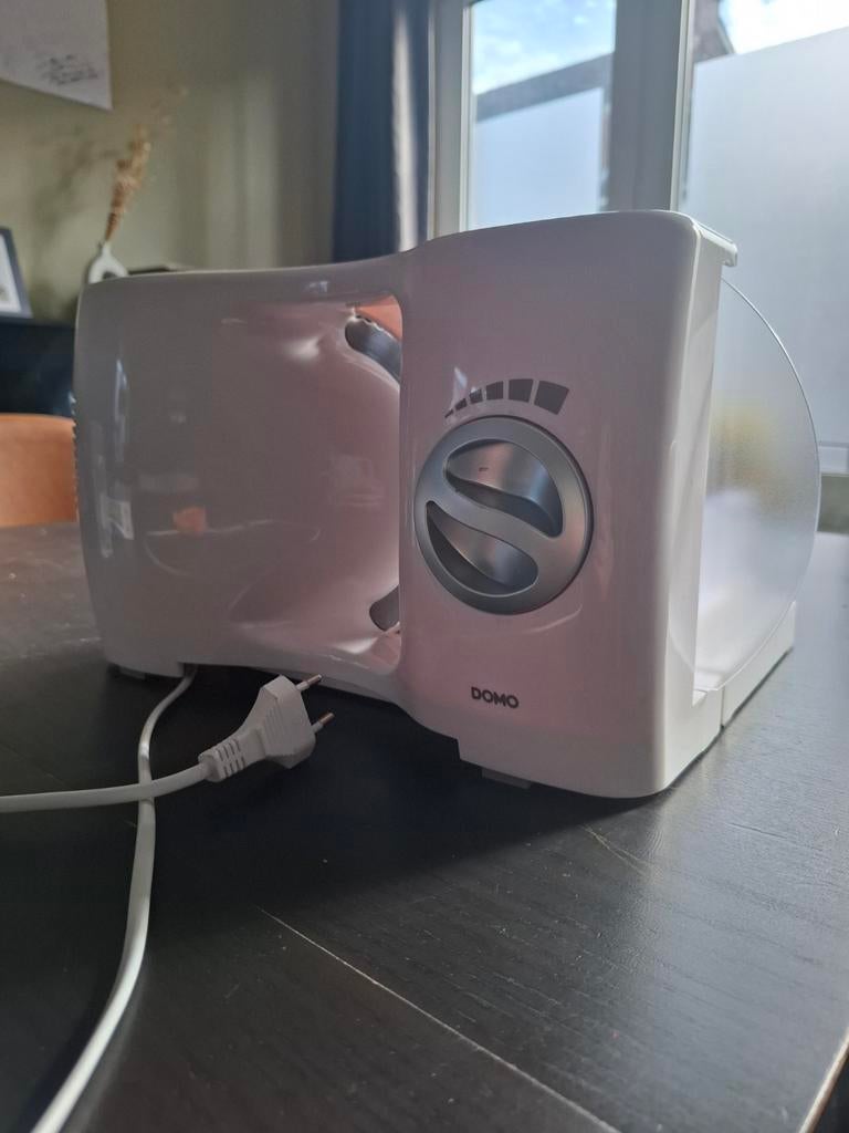 Broodsnijmachine DOMO, Ophalen